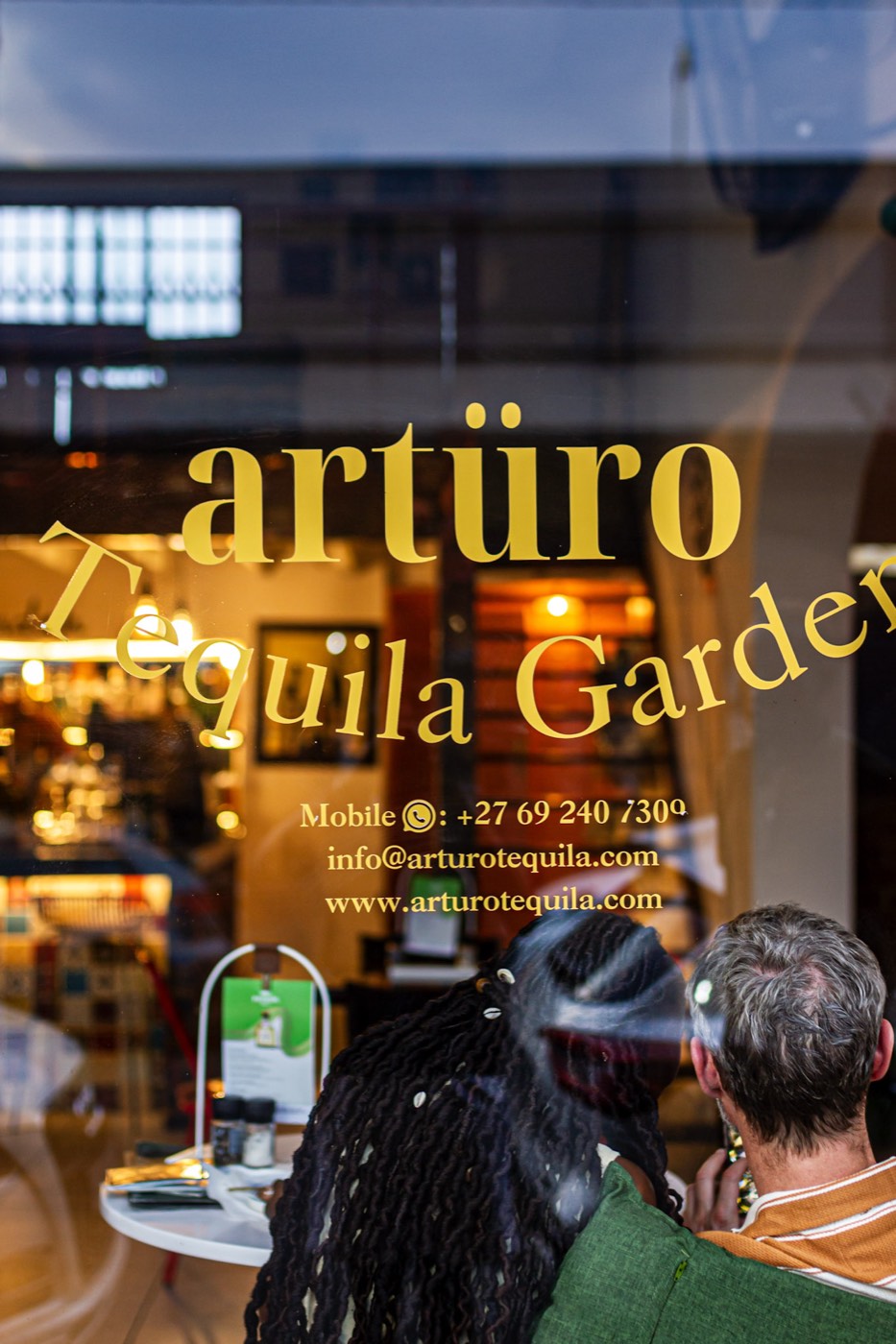 Golden hour through the Artüro Tequila Garden window